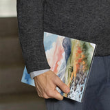 A business man holds Personalized VistaCase reMarkable Pen Holder Case with Landscape design